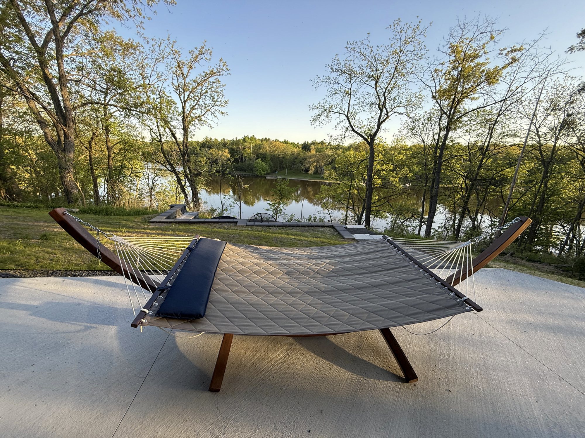 Hammock above the river at golden hour