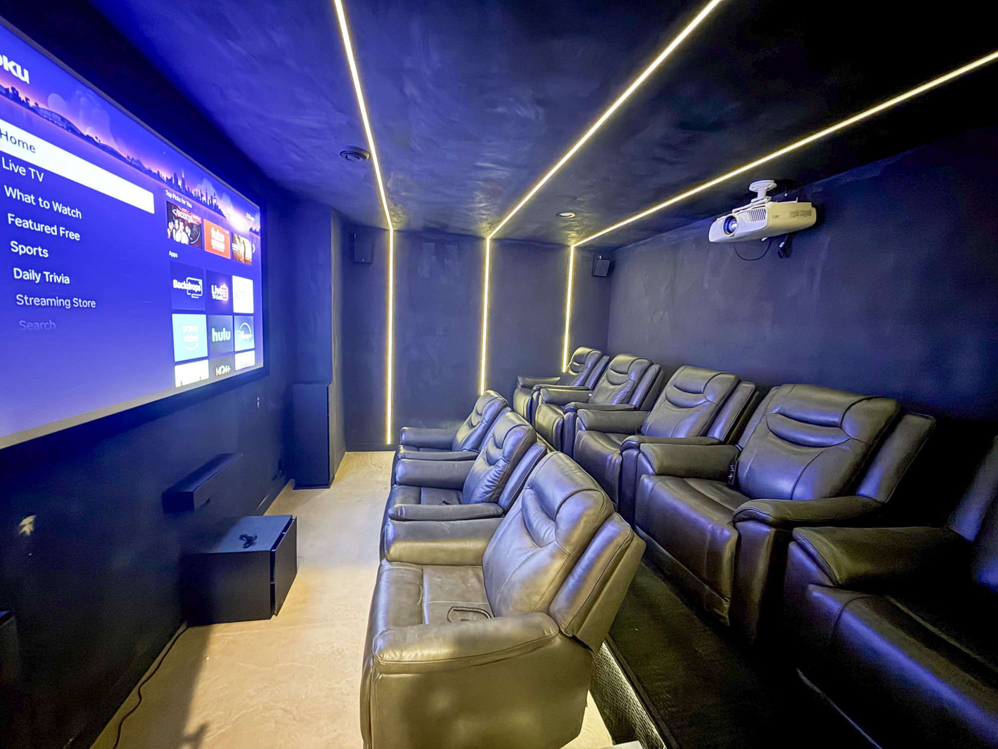 Private theater with recliners and star-line lighting